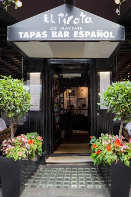 The exterior corner facade of El Pirata tapas restaurant.