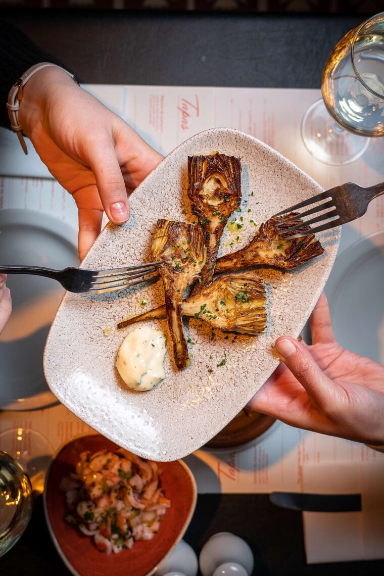 Artichoke couple sharing tapas romantic moments