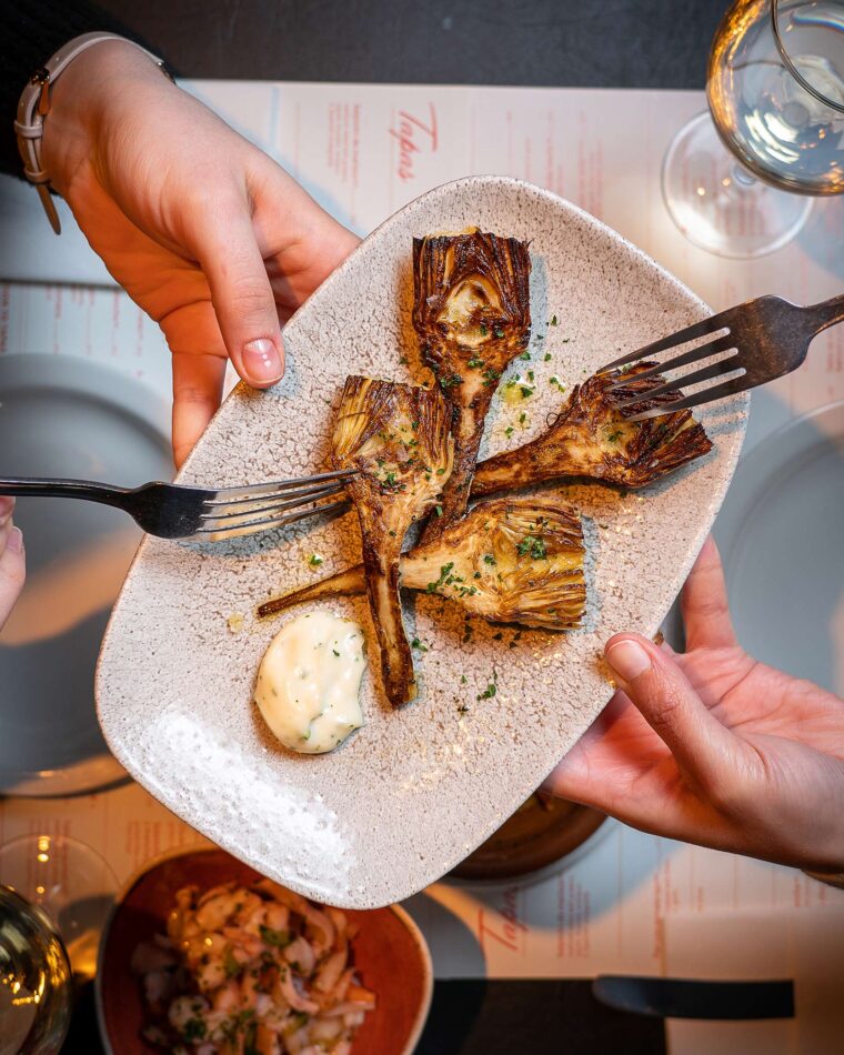 Artichoke couple sharing tapas romantic moments