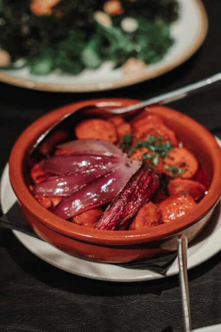 Tapas premium chorizo served in traditional terracotta dish