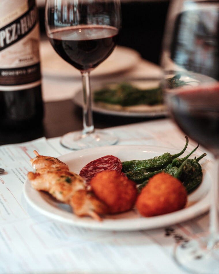 Glass of Lopez Rioja Spanish red wine from Northern region served with Tapas
