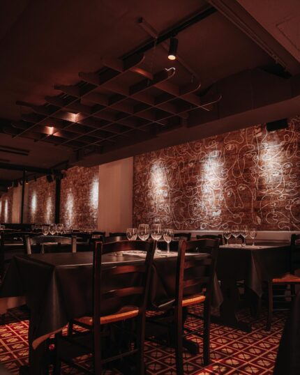 Warm holiday lighting illuminating our dining room ahead of an evening celebration.
