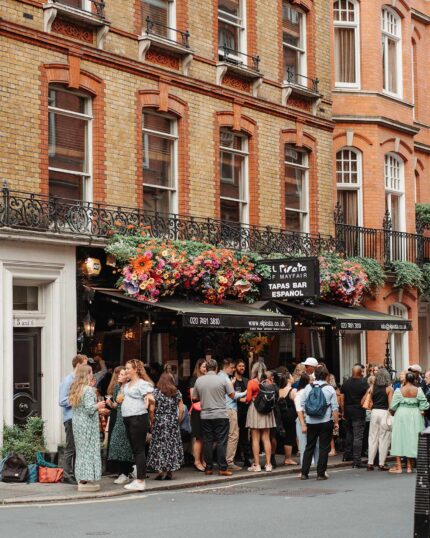 Group party standing reception wine tapas bar Mayfair London
