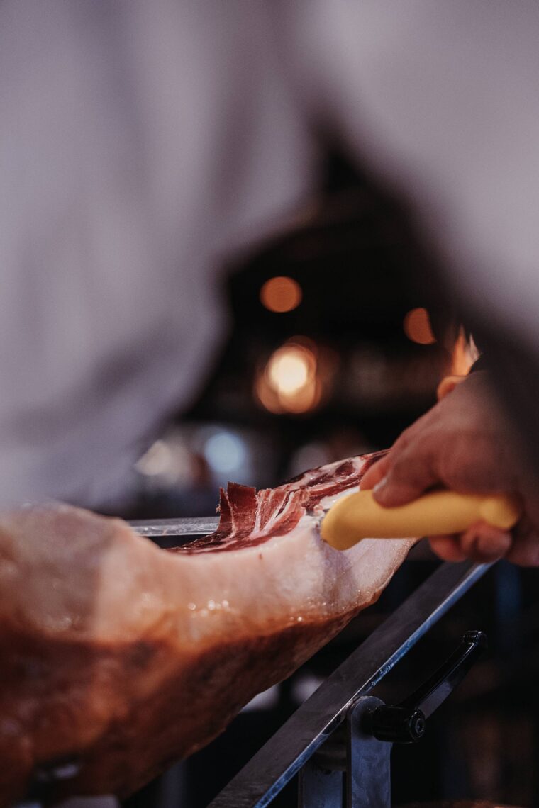 Jamon iberico ham cutting in restaurant Mayfair