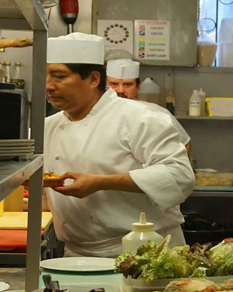 Head Chef Rosendo Simbana preparing authentic Spanish tapas at El Pirata Mayfair.