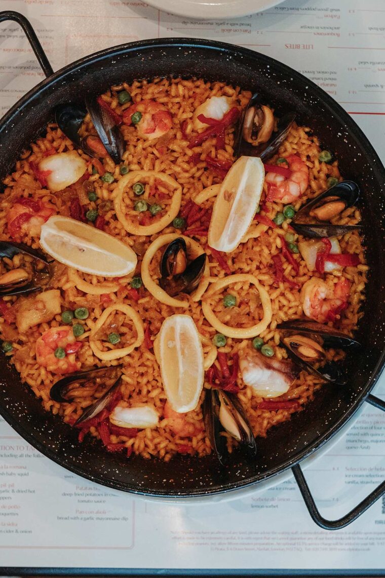Seafood paella in cast iron pan traditional classic Spanish dish