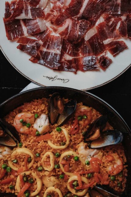 A platter of freshly carved Jamón Ibérico served at El Pirata Mayfair
