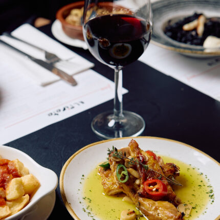 A variety of classic Spanish tapas dishes laid out on a table for lunch.