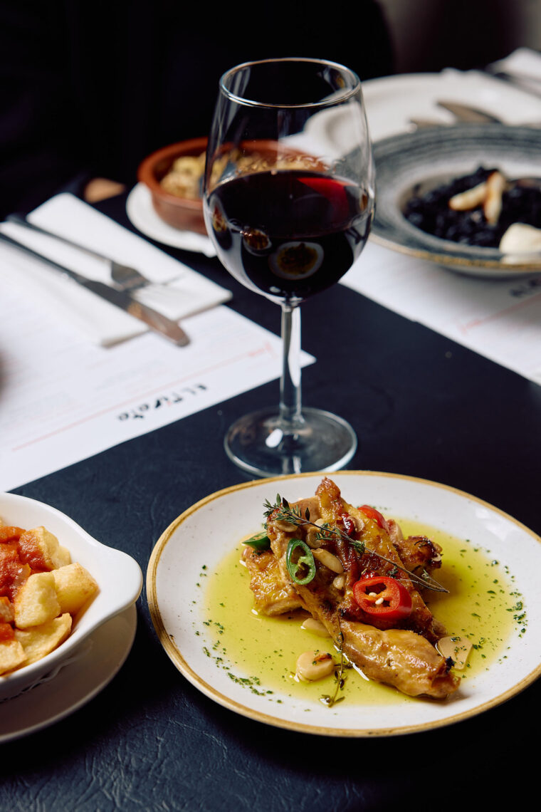 A variety of classic Spanish tapas dishes laid out on a table for lunch.