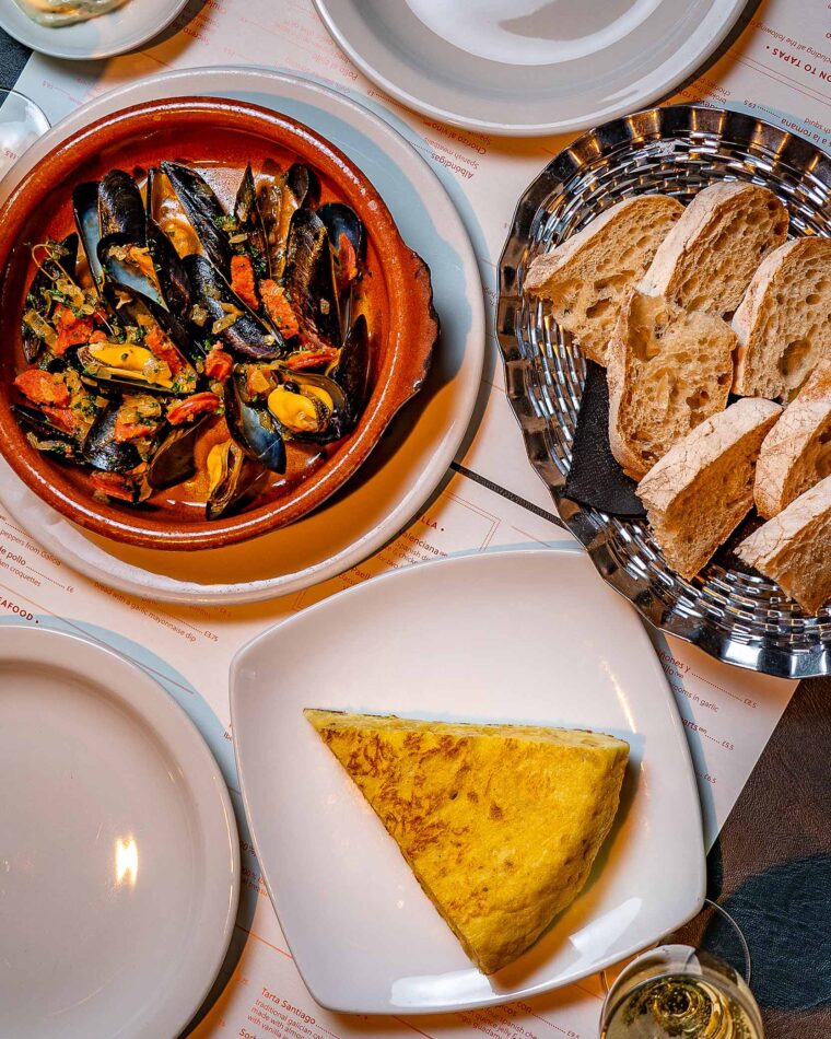 Slice of tortilla tapas served with mussels