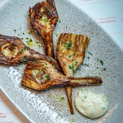 Small plate tapas dish artichoke with Alioli served in the restaurant