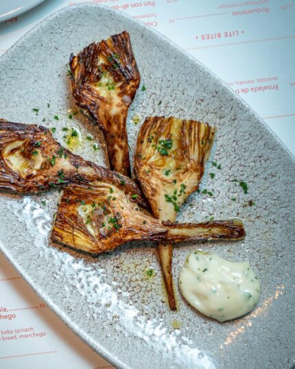 Small plate tapas dish artichoke with Alioli served in the restaurant