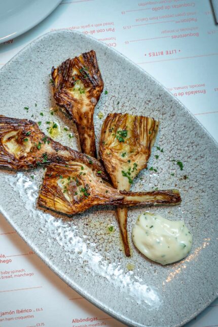 Small plate tapas dish artichoke with Alioli served in the restaurant