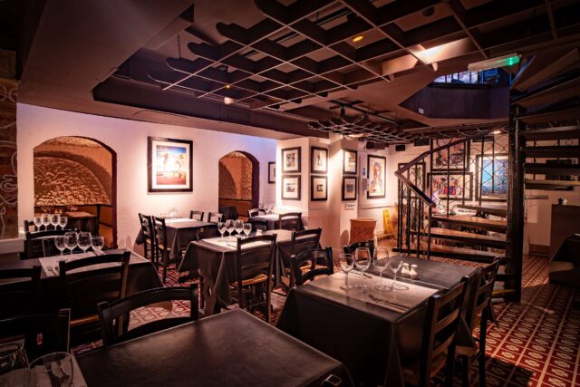 Tapas bar restaurant wine cellars premier venue for group party celebratory dining tables stairs